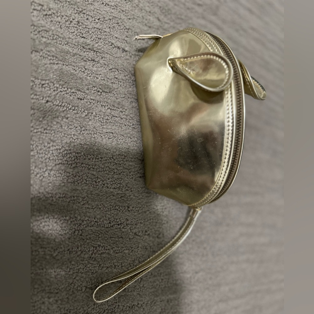 Yazbukey gold mouse cosmetic pouch.